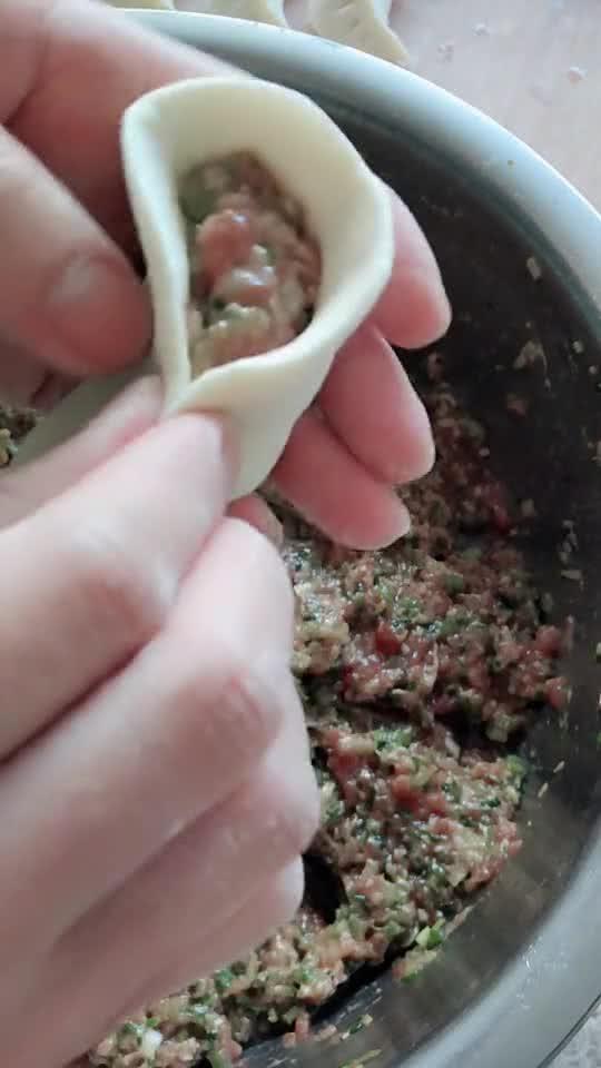 饺子的包法,传统与创新的完美结合,传统与创新交融,饺子的精致包法