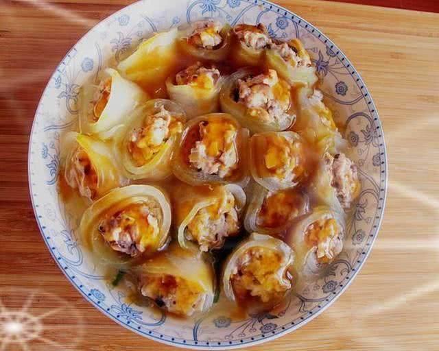 红烧狮子头,传统美食的魅力与制作方法,传统美食红烧狮子头的魅力与制作方法详解