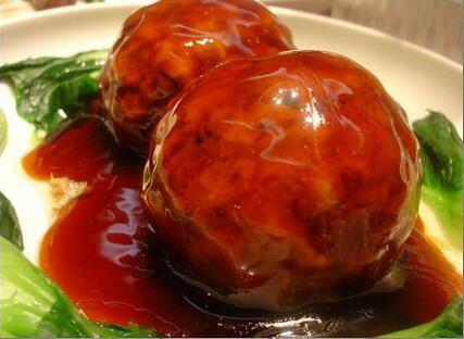 红烧狮子头,传统美食的魅力与制作方法,传统美食红烧狮子头的魅力与制作方法详解